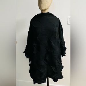 Black Dress/Tunic. Textured fabric, black. “Sculptural”feel and look. NWT.